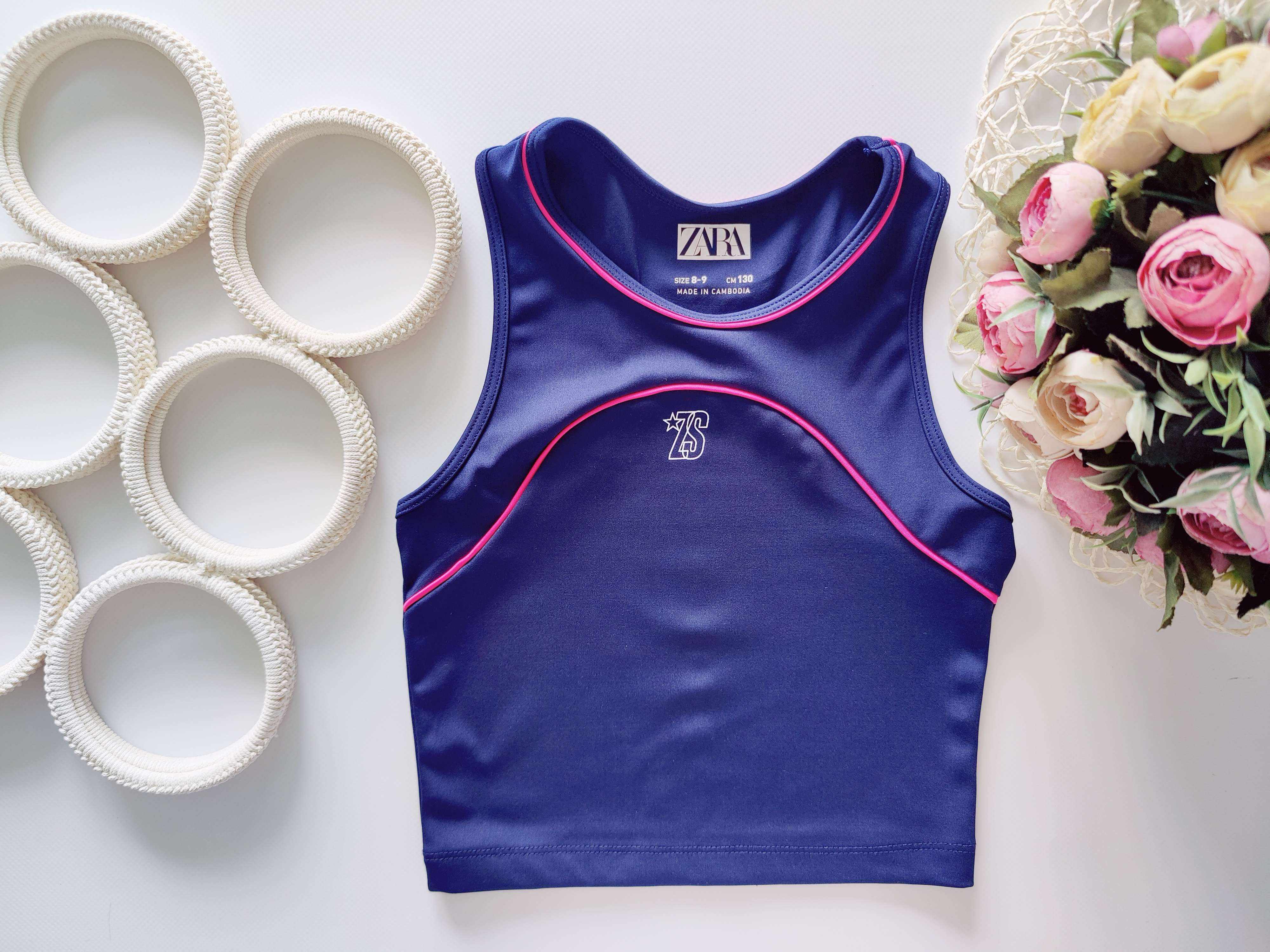 8,9 лет, рост 130 Брендовый спортивный топ