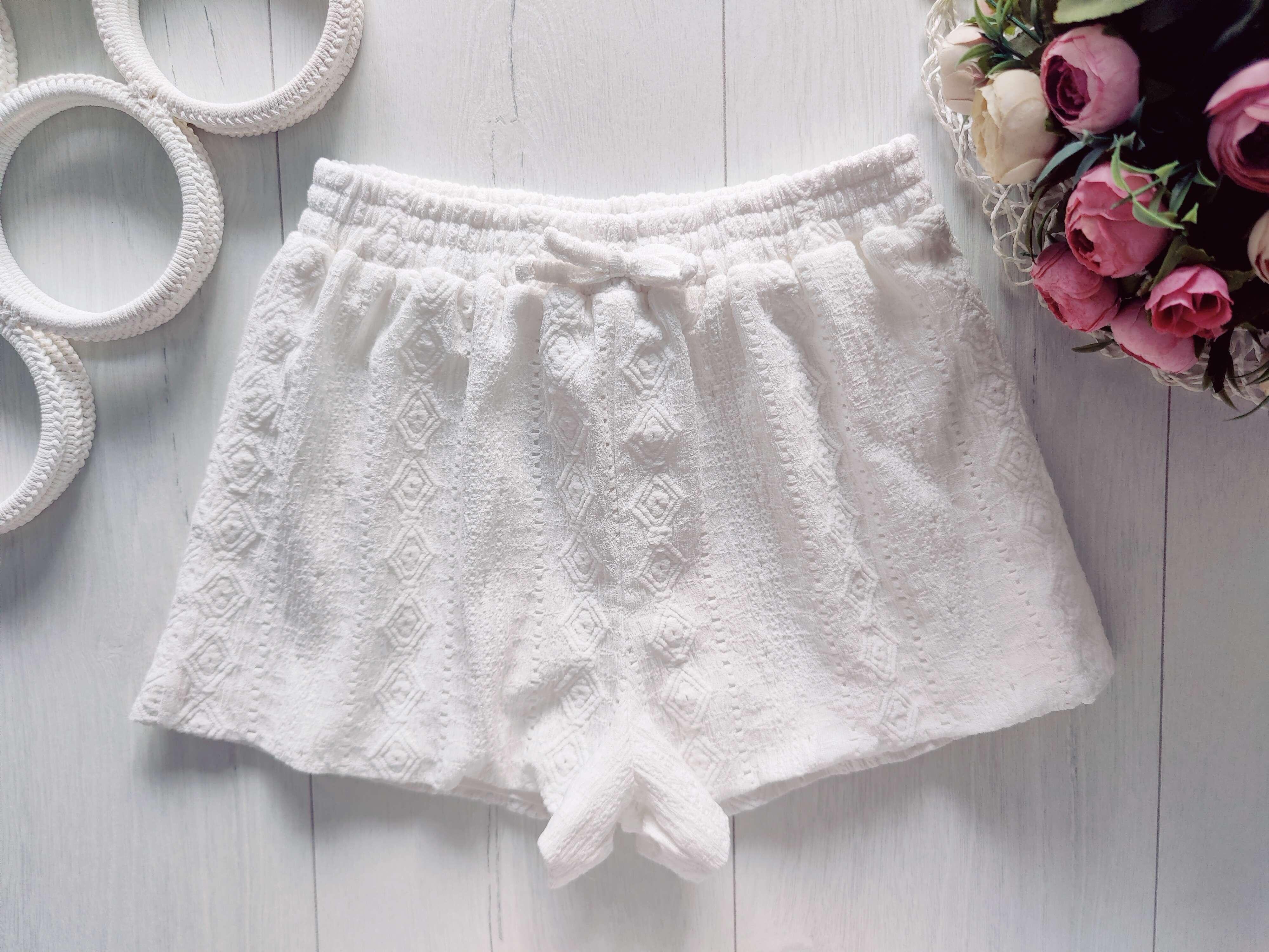 8 років, зріст 128 Білі шорти