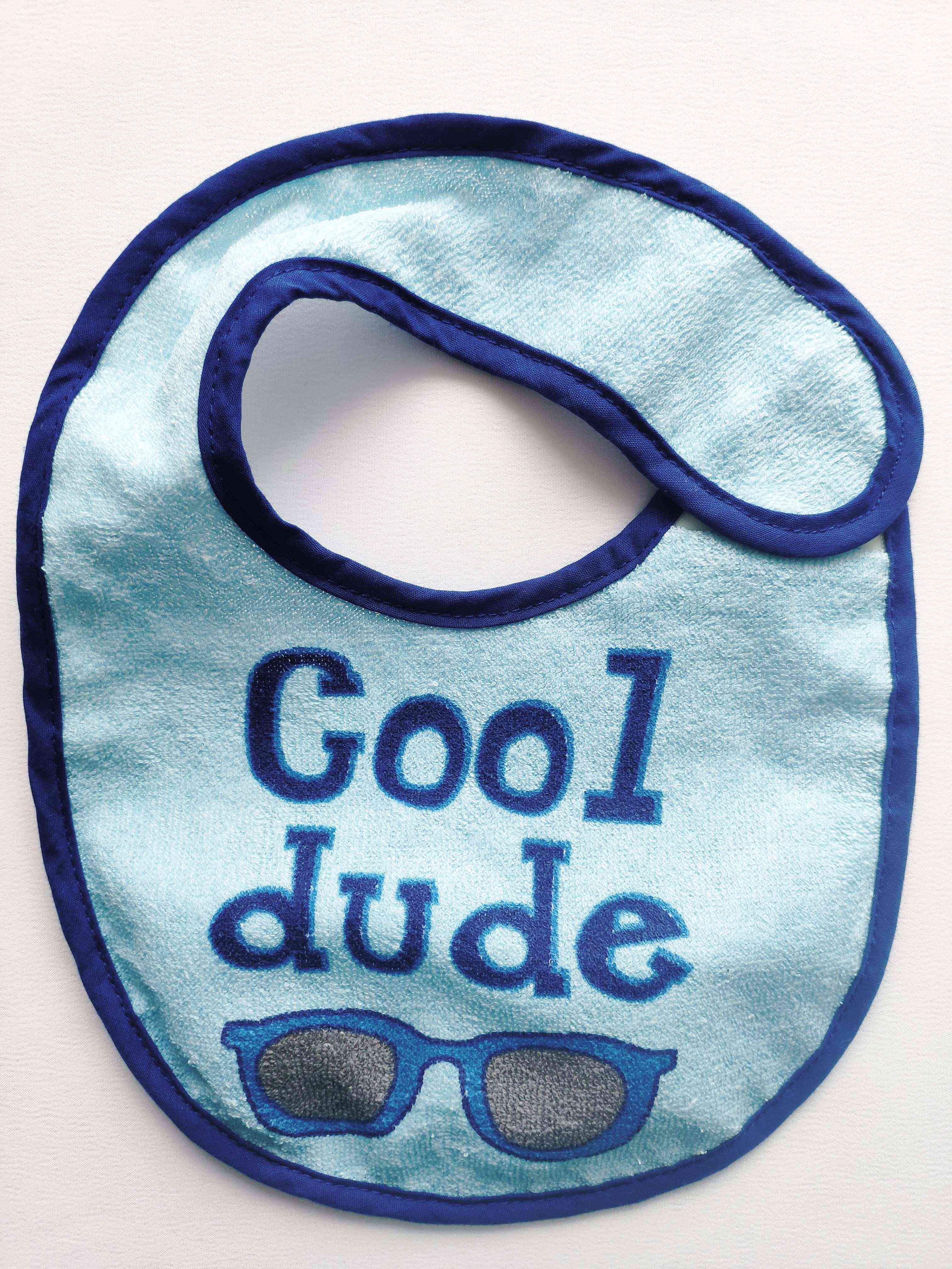 Нагрудник слюнявчик на клейончастій основі