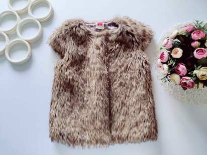 9 лет, рост 134 Меховая детская жилетка