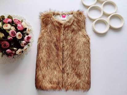 8 лет, рост 128 Детская меховая жилетка