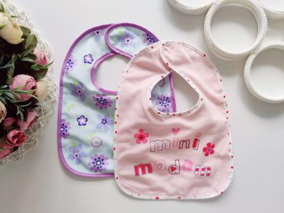 Нові слинявчики нагрудники набором на липучках, основа клейончата