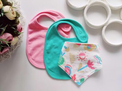 Нові слинявчики нагрудники набором